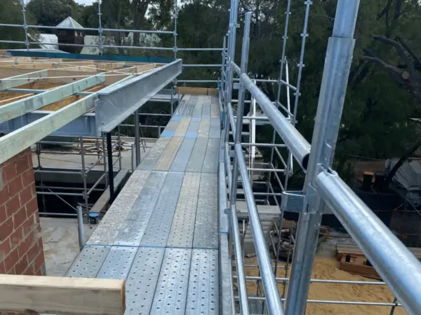 Scaffold platform along a roof edge for edge protection on a Dunsborough job