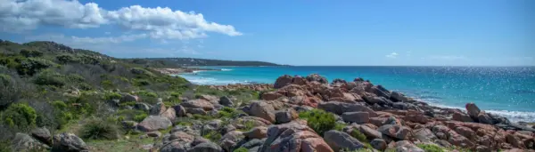 Rocky coastline and turquoise ocean at Eagle Bay