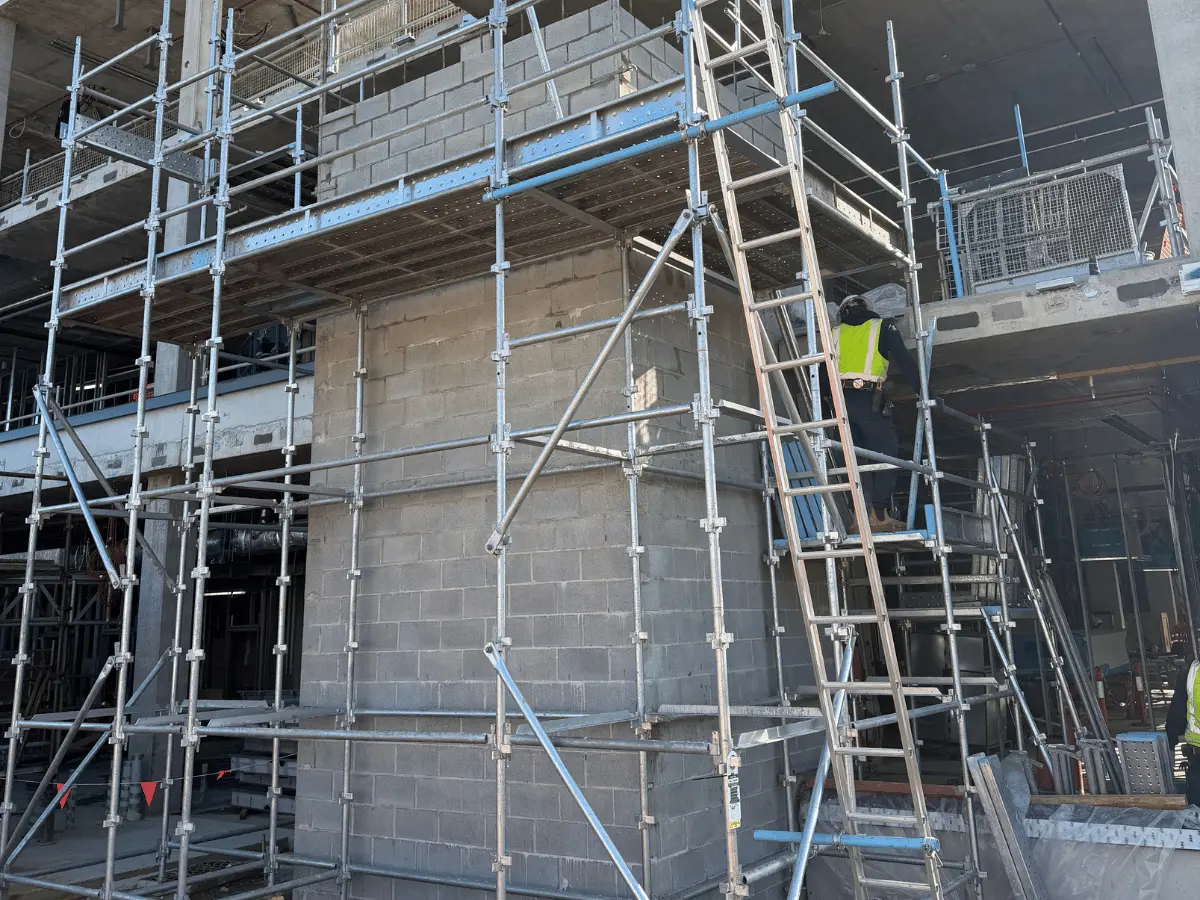 Elevator shaft access platform installed during construction
