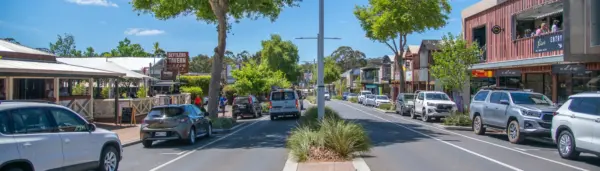 Margaret River main street with cafes, shops and parked cars