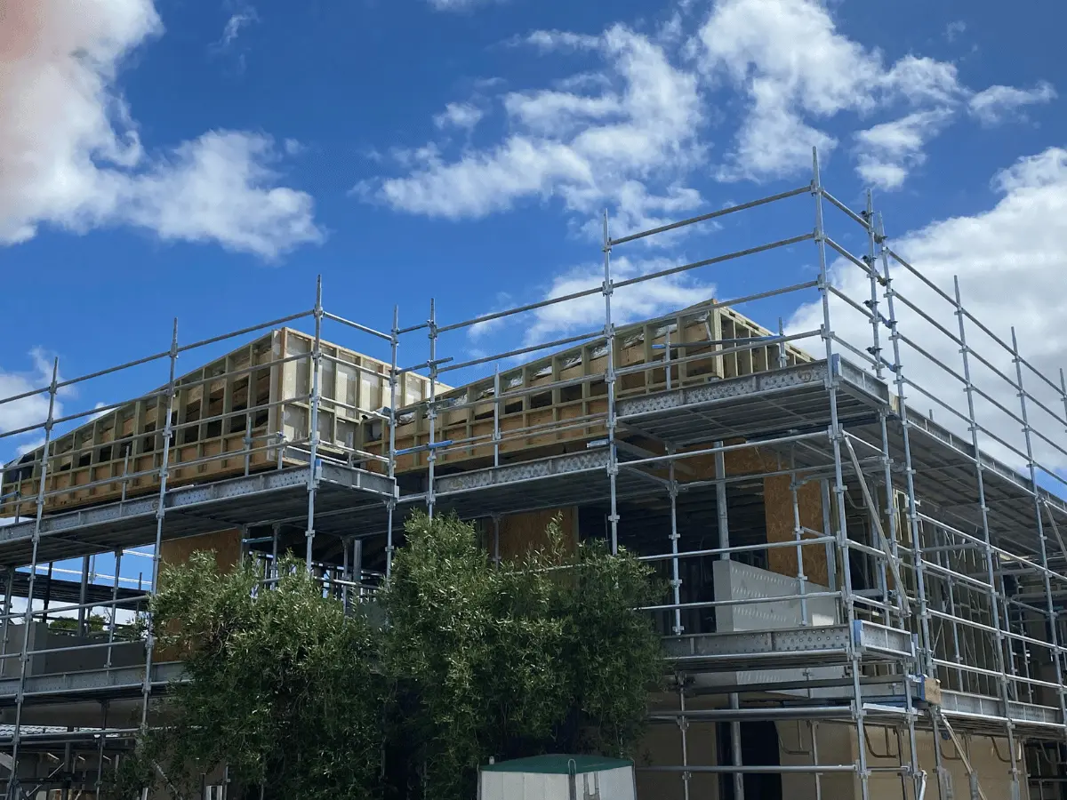 Two-storey home under scaffold during construction in Busselton